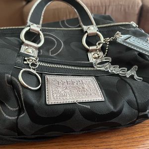 Vintage black and silver coach canvas bag with cool silver accessories